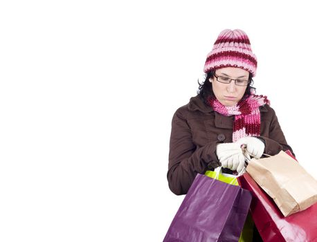 Consumerist Christmas girl with bags in a shopping day