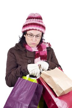 Consumerist Christmas girl with bags in a shopping day