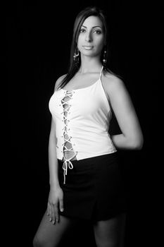 Black and white portrait of a twenty something fashion model in sexy corporate style