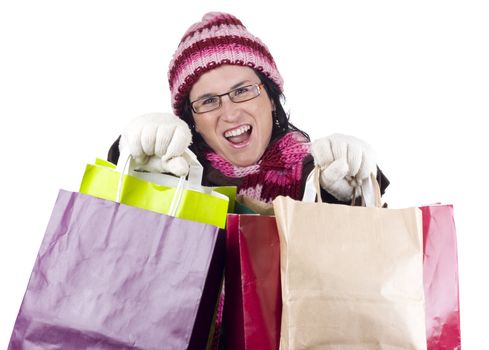 Consumerist Christmas girl with bags in a shopping day