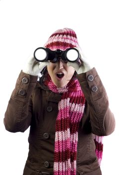 christmas woman holding and looking through binoculars