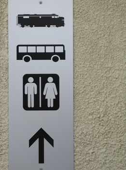 bus, train and washroom sign