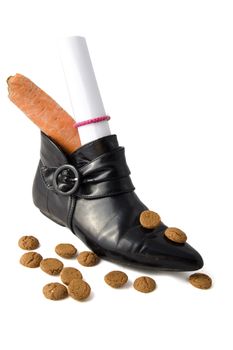 shoe with carrot and letter and dutch candies for an old dutch holiday called Sinterklaas