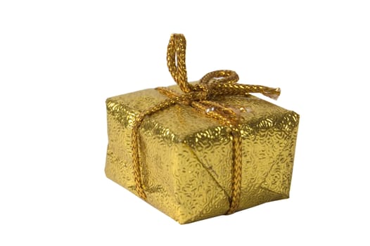 present wrapped in gold paper on a white background