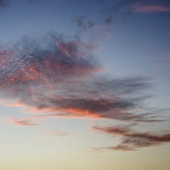 Wispy cirrus clouds at sunrise.