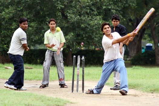 a cricket batsman in action during a cricket match