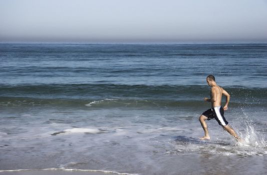 Man doing exercise on the beach