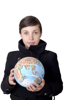 pretty young woman holding the world in her hand