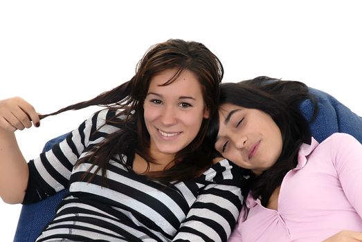 two young casual girls portrait in studio