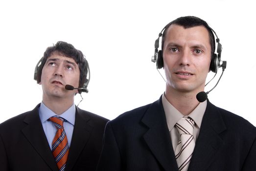 two young call center men talking by the phone