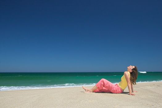 Beautiful young woman relax in the beach