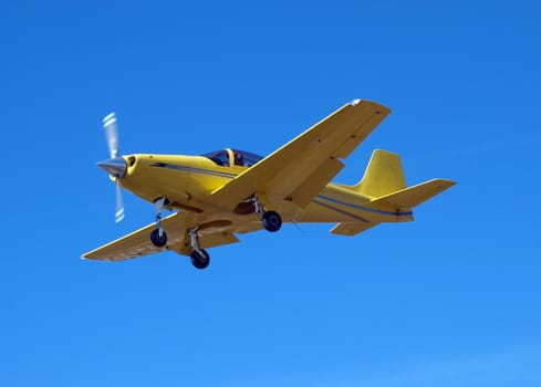 Yellow Kitset Aircraft comimg in to land