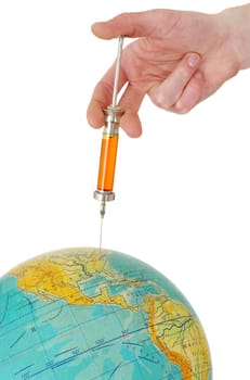 Hand with a syringe doing an injection to the terrestrial globe on the white background