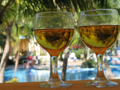 beer glasses by the pool