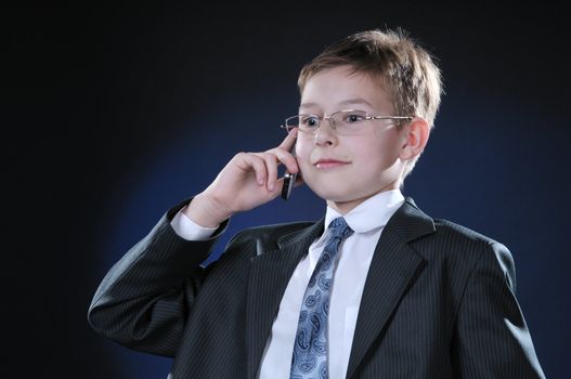 Teen discussing important business on the cell phone