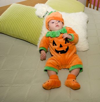Baby girl dressed for Halloween.