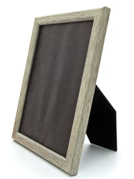 decorative wooden photo frame against white background