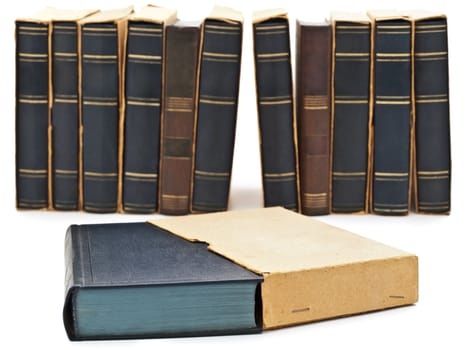  Photo of old books row at white background