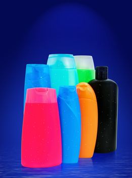 different toiletries plastic bottles over the blue