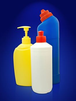 different toiletries plastic bottles over the blue
