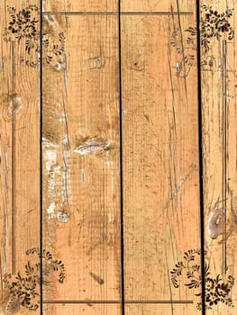 vintage floral frame at aged wooden background