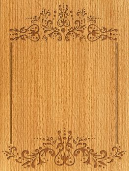 vintage frame with swirls at aged wooden background