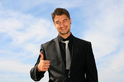 Business man showing okay sign