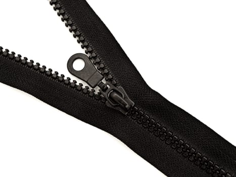 black plastic opened zipper against white background