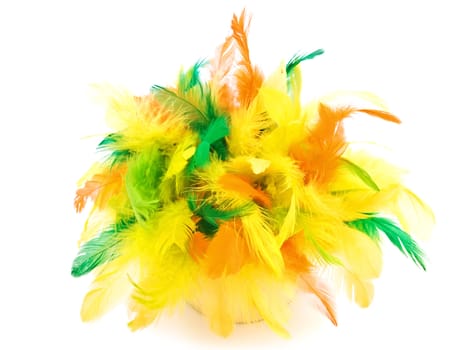 Bright easter composition with multicolored feathers over white