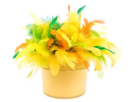 Bright easter composition with multicolored feathers in flower pot