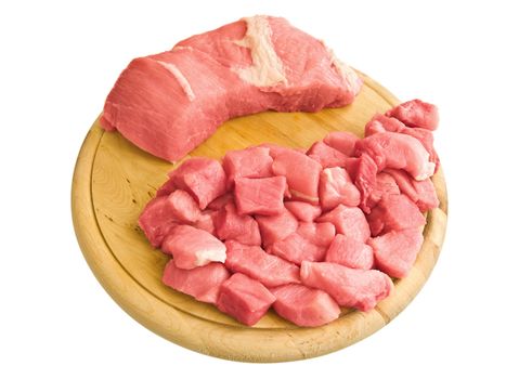 pieces of meat on hardboard over white