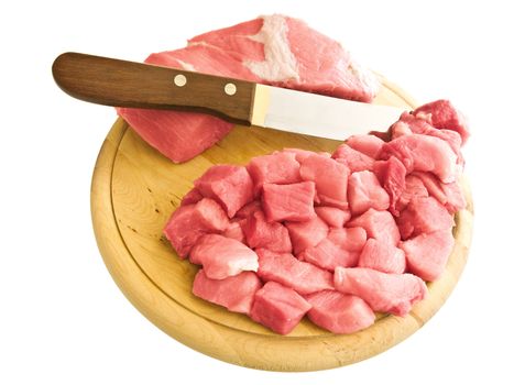 pieces of meat with kitchen knife on hardboard
