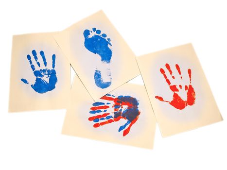 different hand and foot prints on the paper