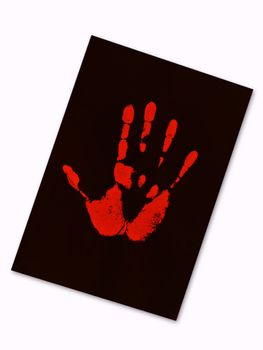 red hand print on the black paper