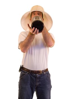 A young man drinking alcohol from a giant bottle