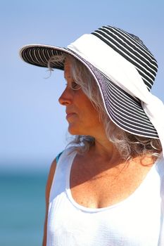 golden age female at the beach