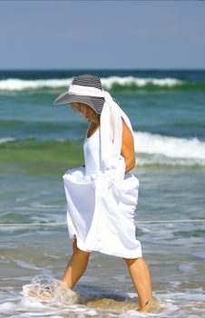 an older femal at the beach