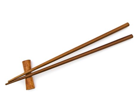 Two wooden chopsticks over white background