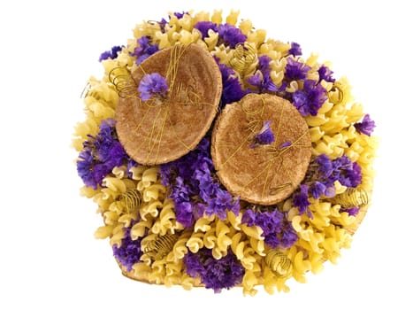  yellow pasta and flowers in the basket 