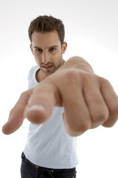 young man pointing on an isolated white backgound