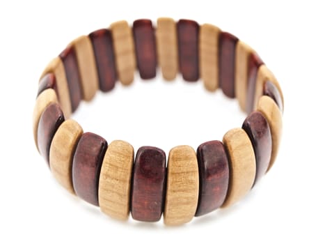 wooden bracelet over white background