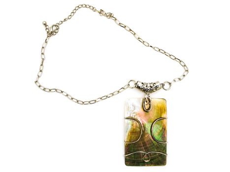  fashion necklace with metal decoration over white background