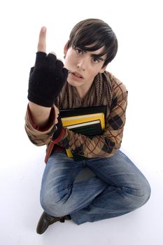sitting student showing finger with white background