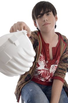 smiling young architect showing his helmet on an isolated background