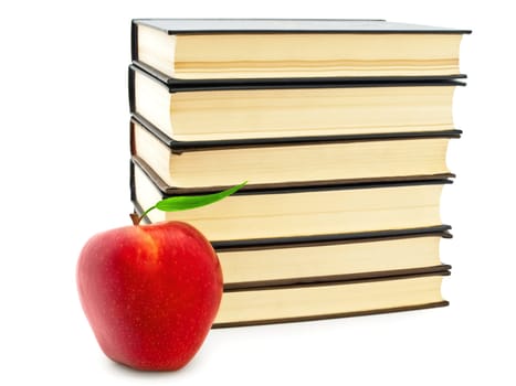 "Back to school!"  theme with red apple and stack of books over white