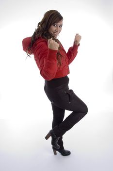 beautiful woman giving winning expression on an isolated background