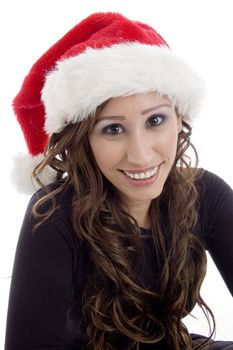 smiling woman wearing christmas hat against white background