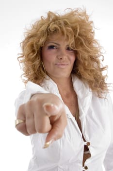 smiling model indicating you against white background