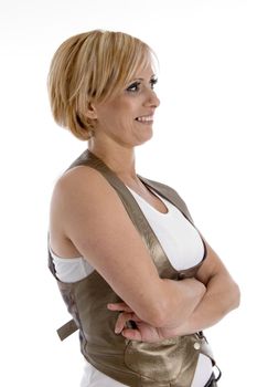 side view of woman with crossed arms on an isolated background
