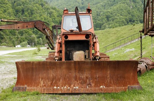 An old tractor abandoned in a valley